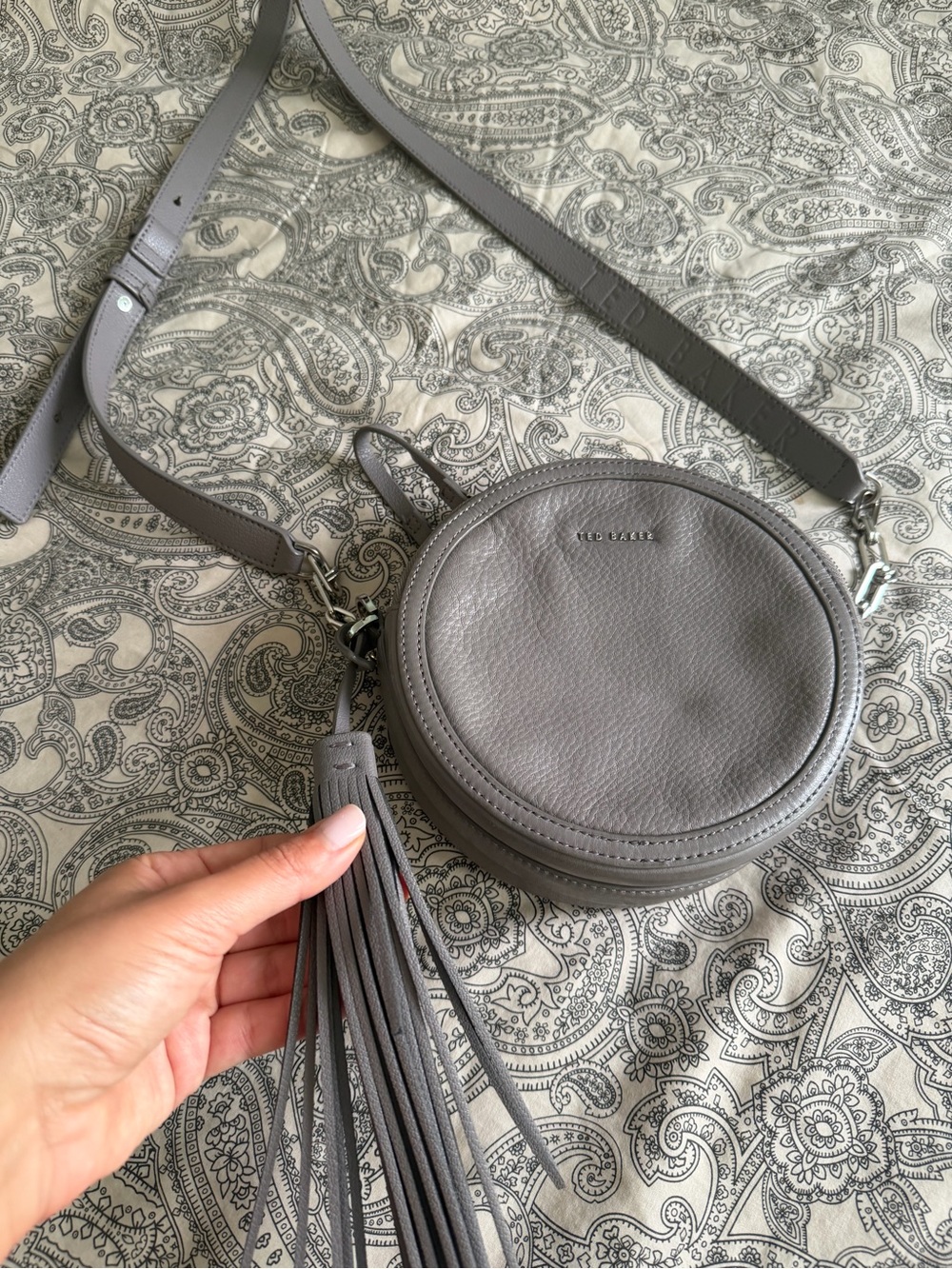 Ted Baker Grey Round Leather Crossbody with Tassel Accent